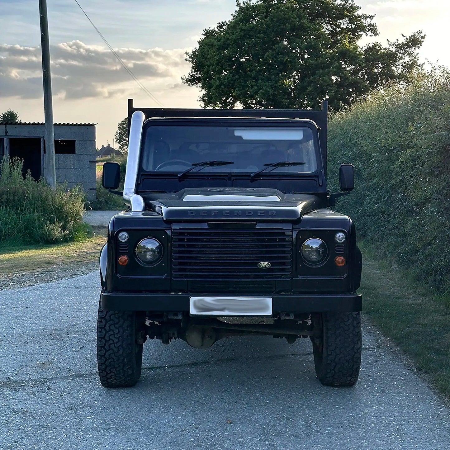 Front view of Landrover Defender with stainless Snorkle Kit fitted