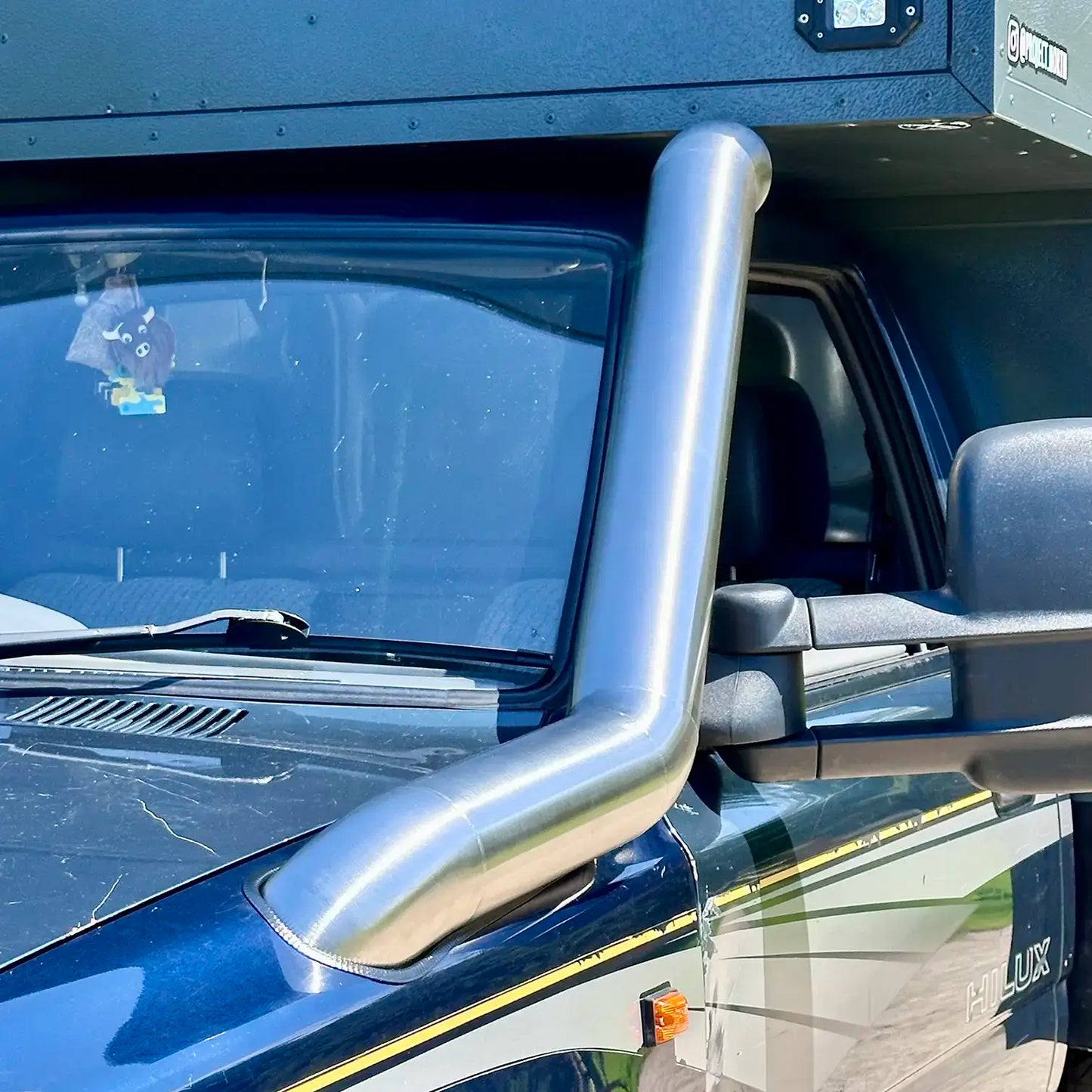 close up view of toyota hilux mk3 with stainless steel snorkle kit