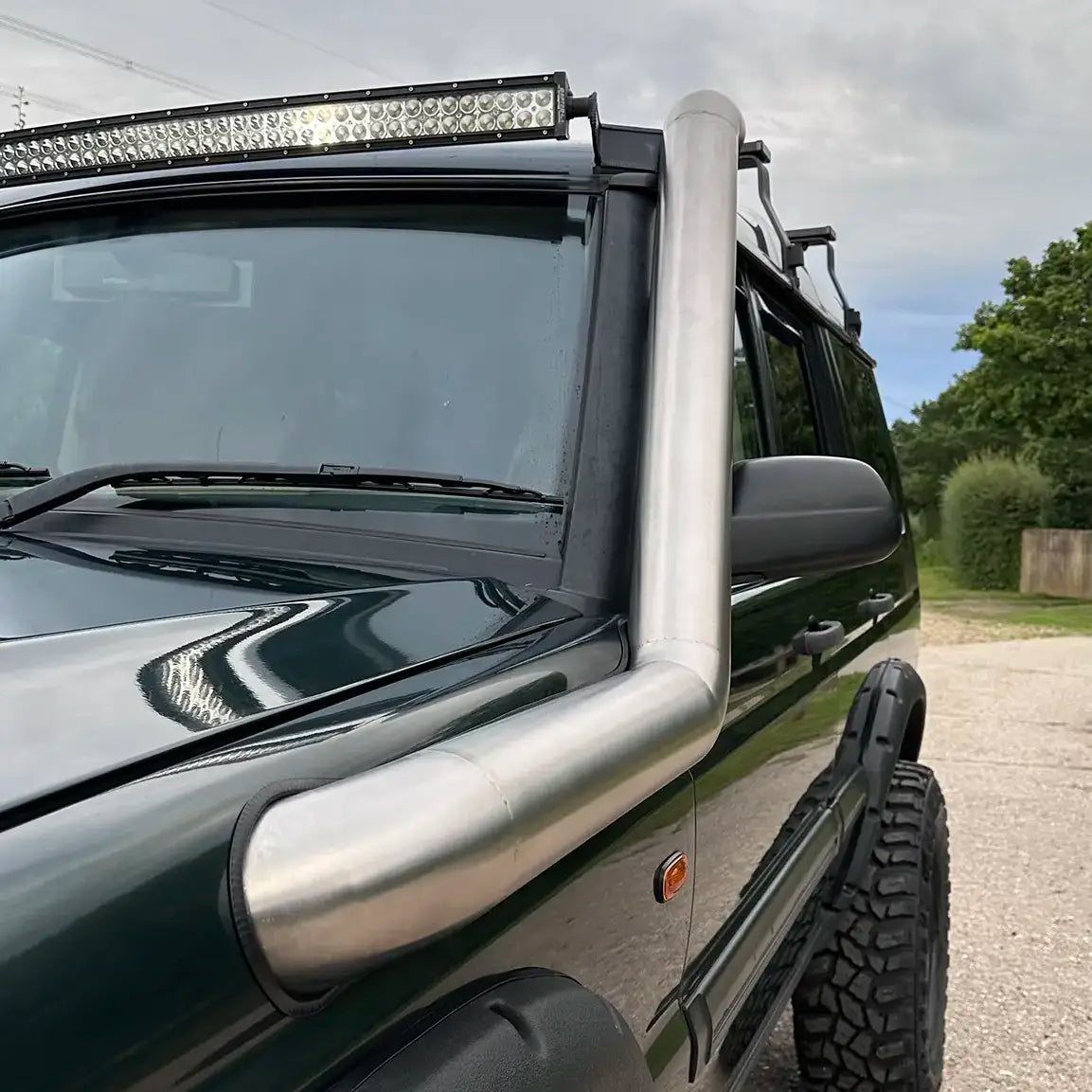 Close-up of the snorkel's seamless welds and polished surface, reflecting the high-quality craftsmanship