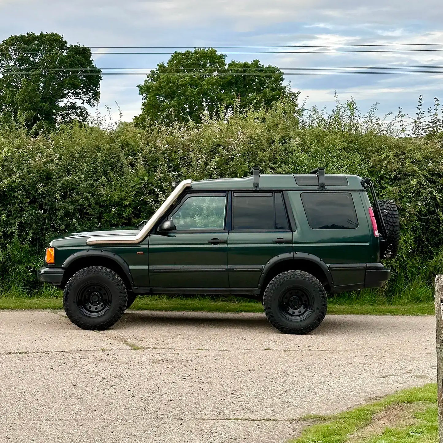 Side profile of the Discovery 2 with the long entry snorkel installed, highlighting the sleek design