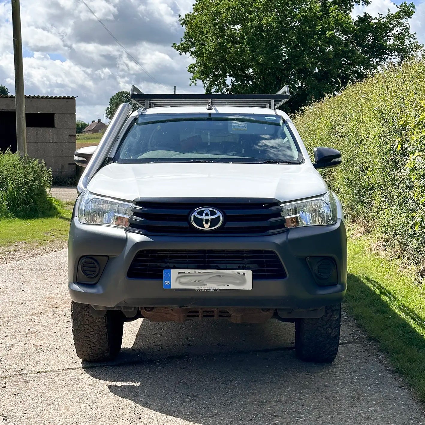 Front view of Toyota Hilux Mk8 with midi entry stainless steel snorkel kit installed