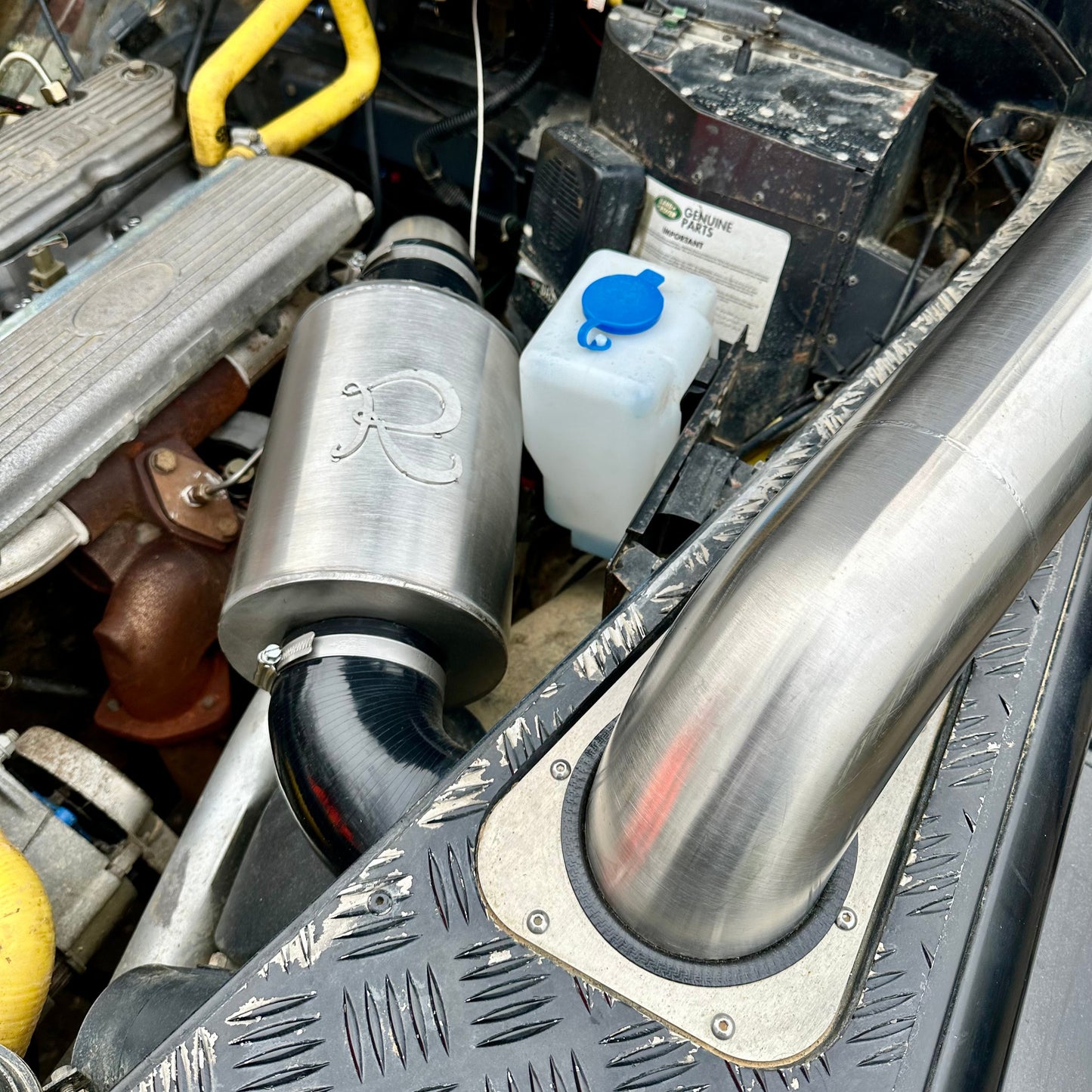Close-up of 304 stainless steel airbox highlighting durable, hand-welded construction
