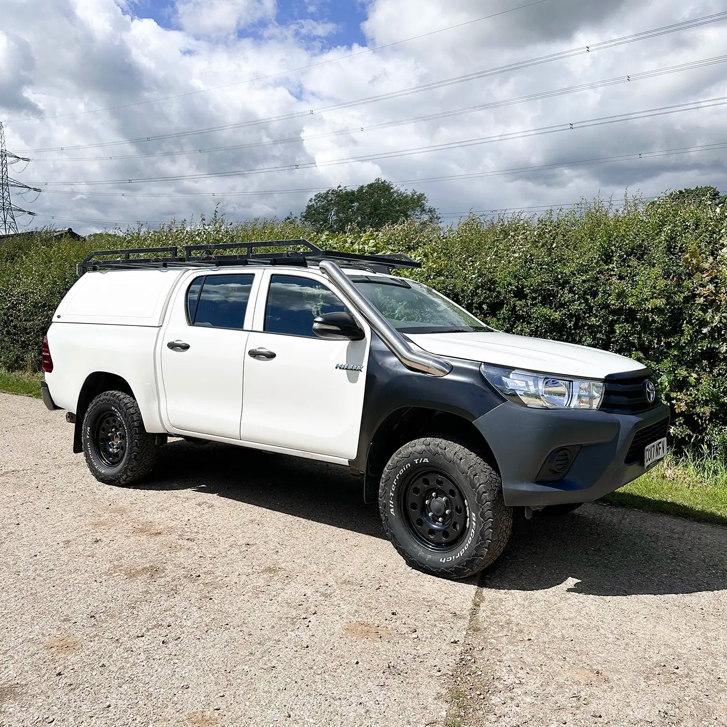Front view of Toyota Hilux Mk8 with midi entry stainless steel snorkel kit installed