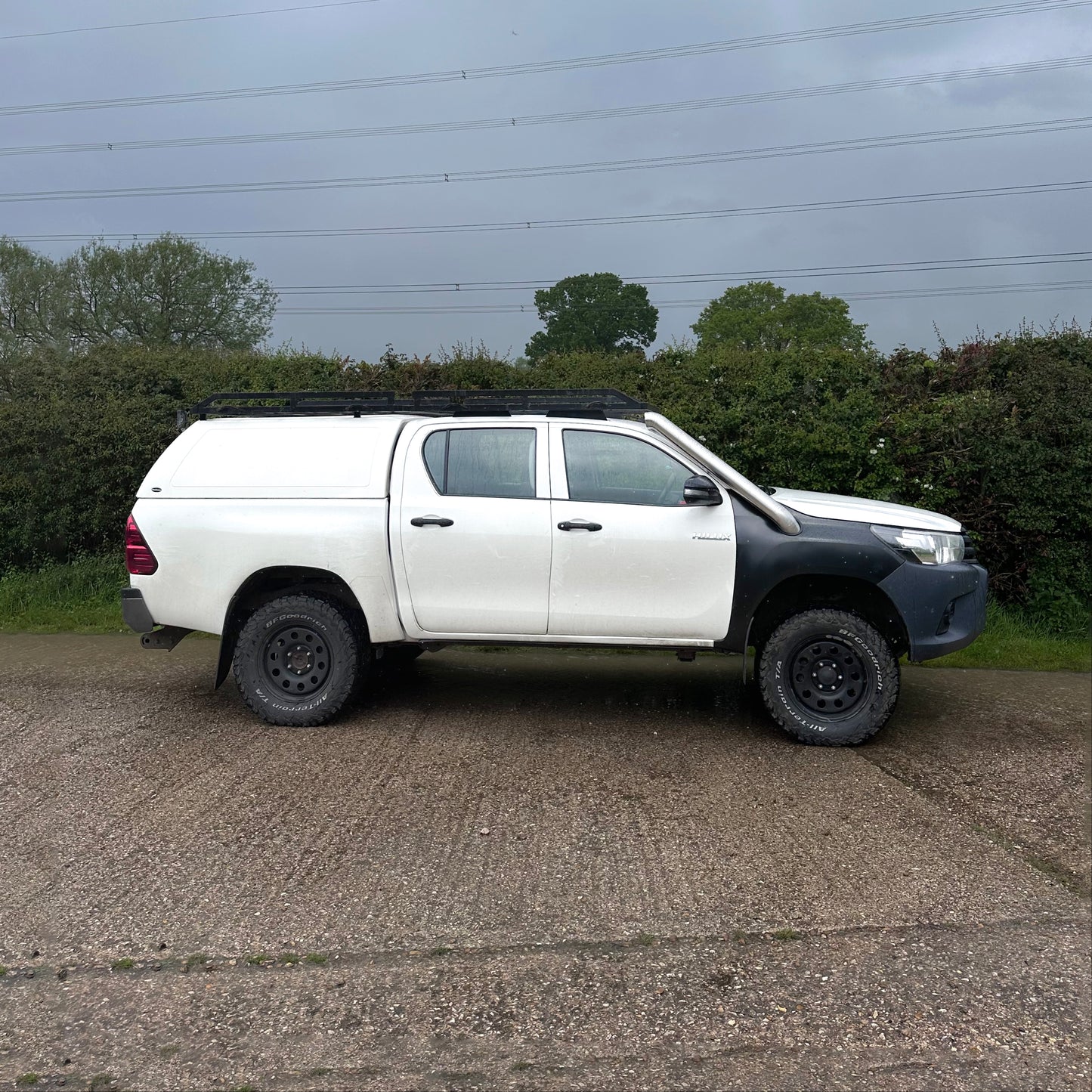 Side profile of Hilux Mk8 showcasing Royalfab 304 stainless steel snorkle
