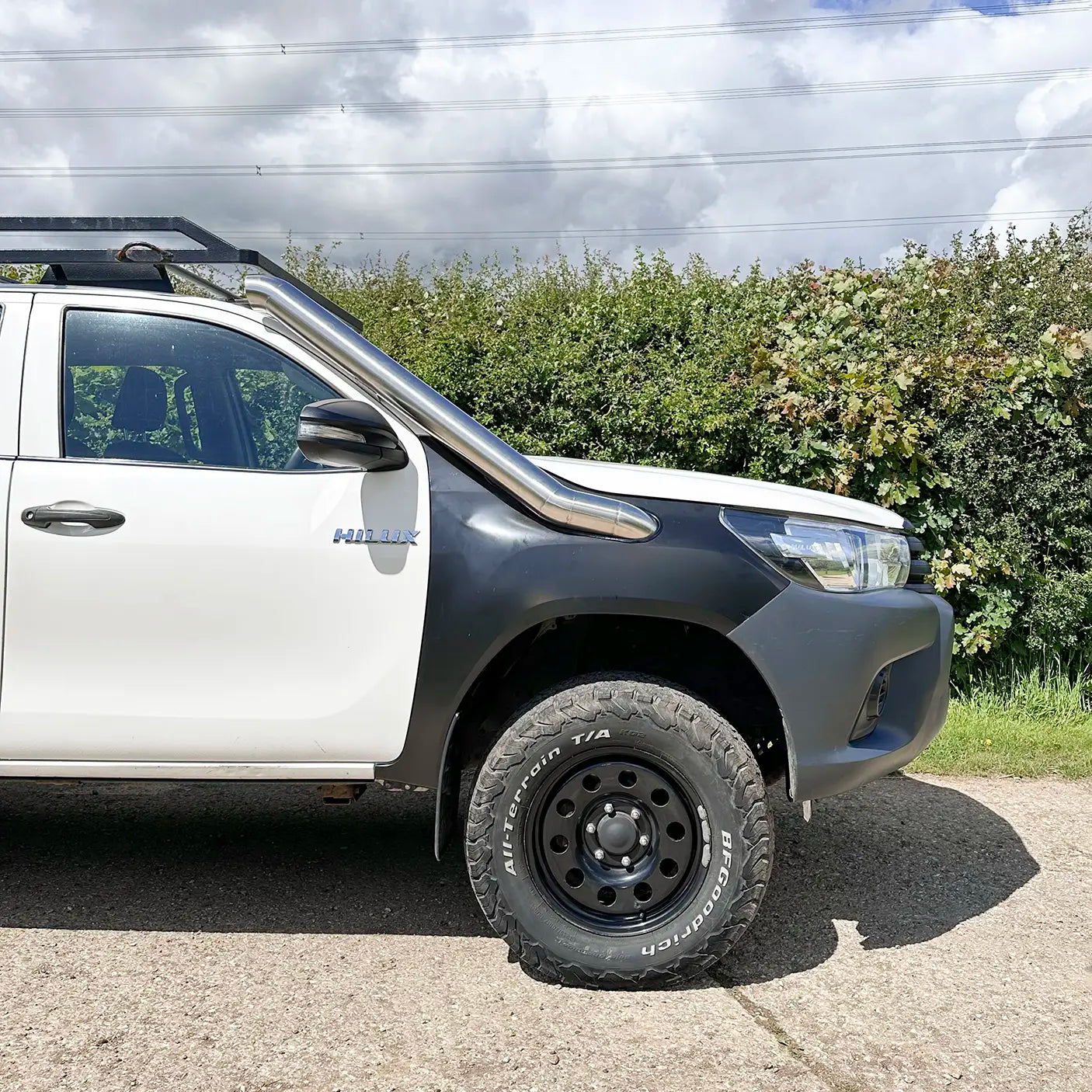 Side profile of Hilux Mk8 showcasing Royalfab 304 stainless steel snorkel