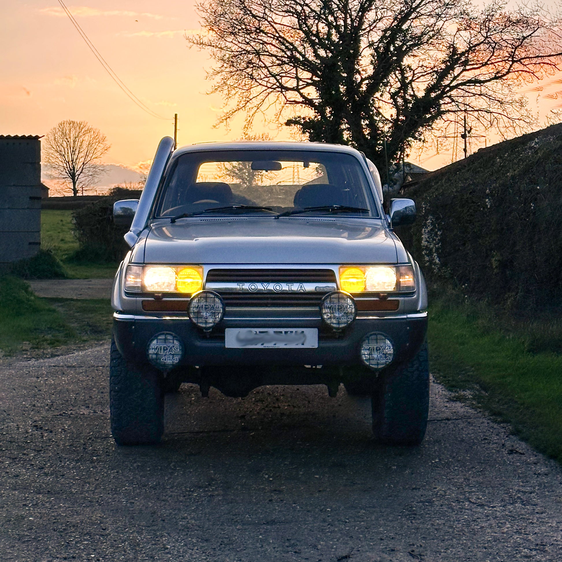 Front view Toyota Land Cruiser 80 with Series Stainless Steel Snorkel Kit fitted