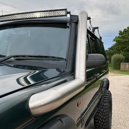 Close-up of the snorkel's seamless welds and polished surface, reflecting the high-quality craftsmanship
