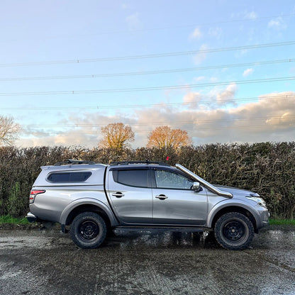 Side angle of Mitsubishi L200 2015–2019 with long entry snorkel kit installed
