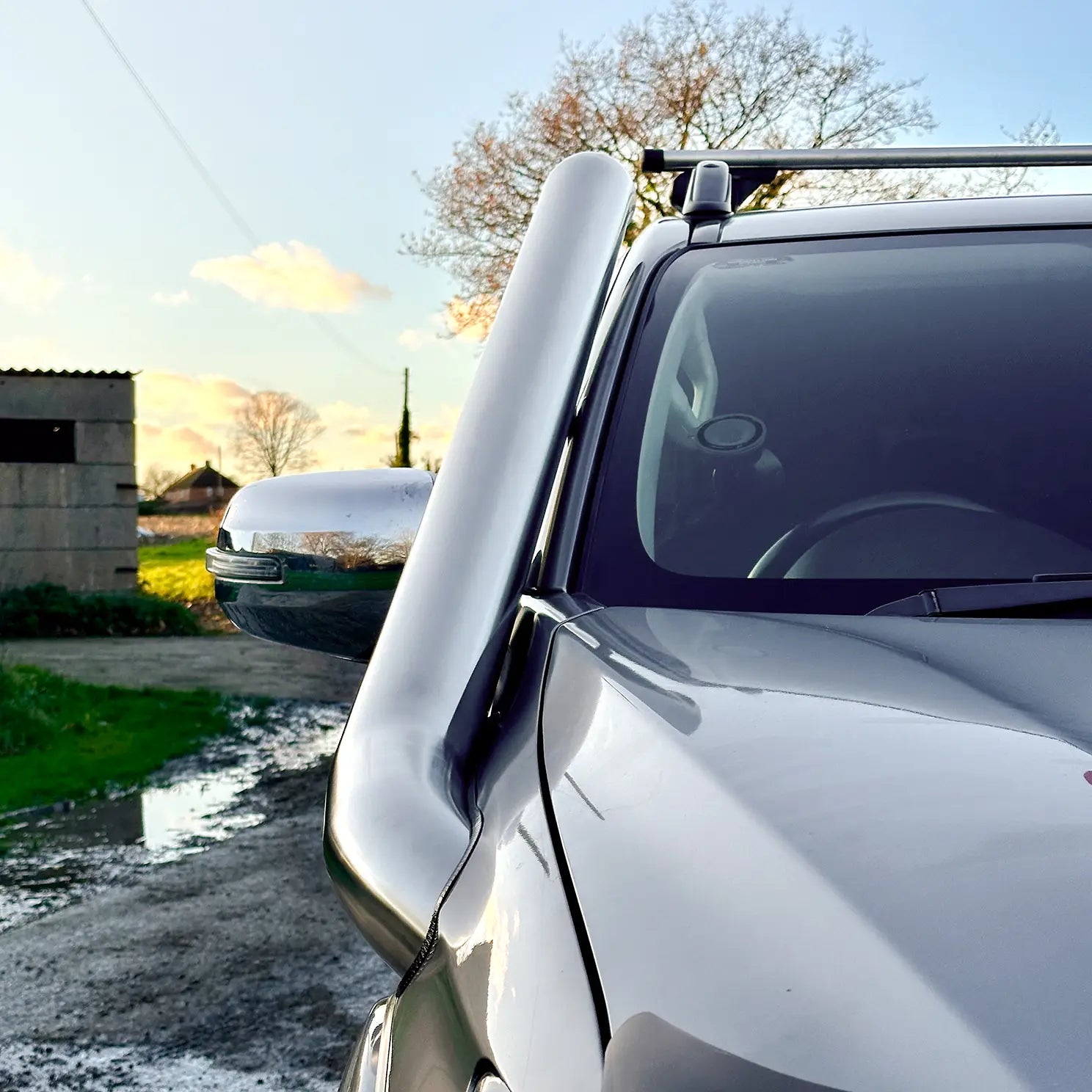 Front angle of Mitsubishi L200 2015–2019 with long entry snorkel kit installed
