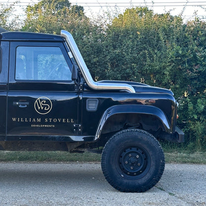 side view of Landrover Defender with stainless steel Snorkle Kit installed