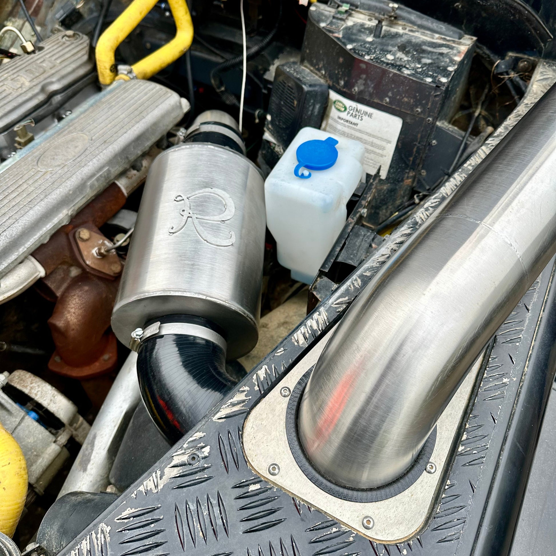Close-up of 304 stainless steel airbox highlighting durable, hand-welded construction