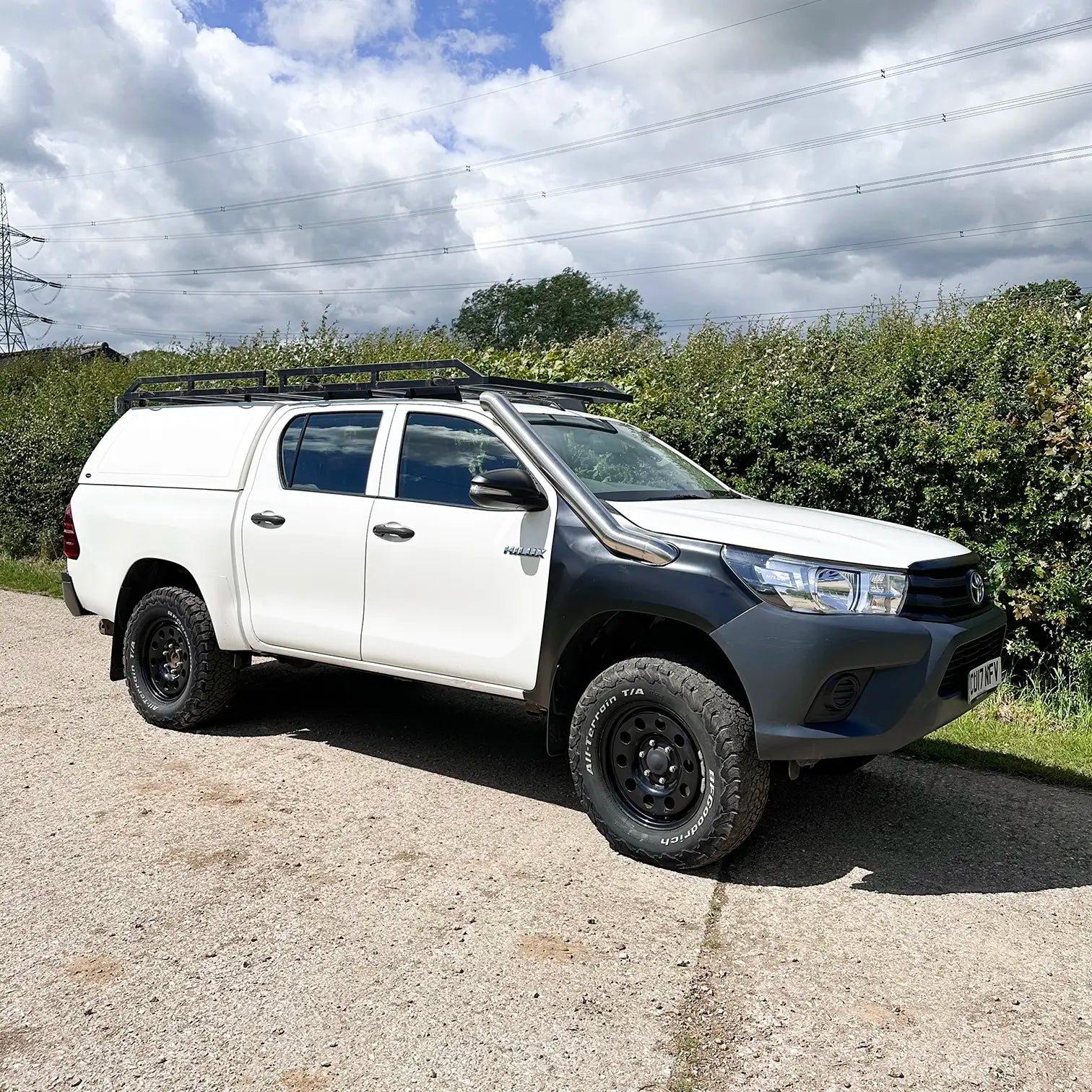 Front view of Toyota Hilux Mk8 with midi entry stainless steel snorkel kit installed