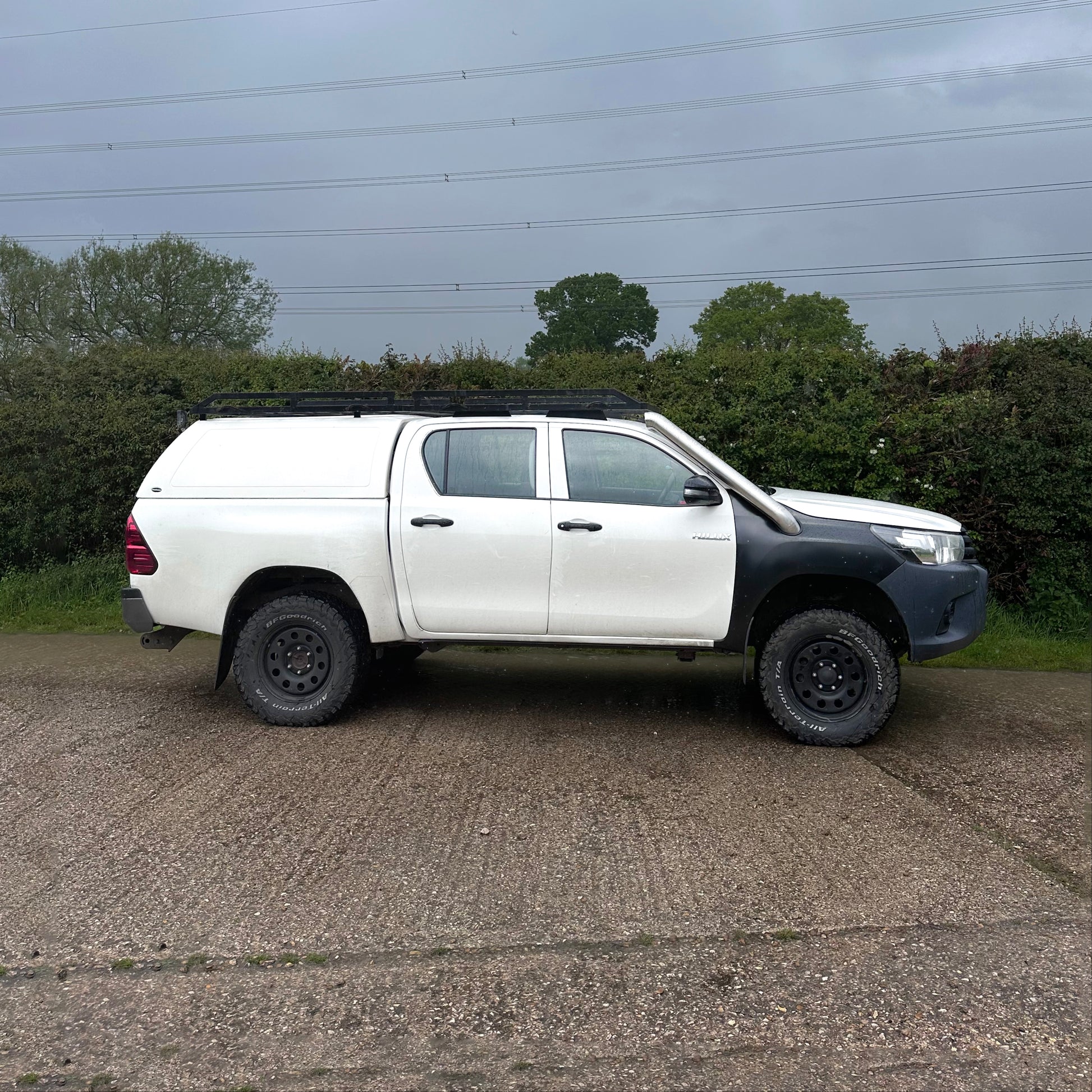 Side profile of Hilux Mk8 showcasing Royalfab 304 stainless steel snorkle