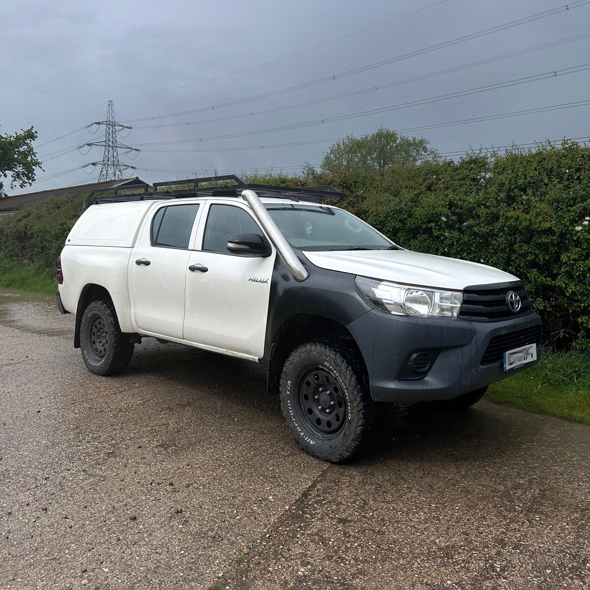 stainless steel snorkel kit fitted to Hilux Mk8